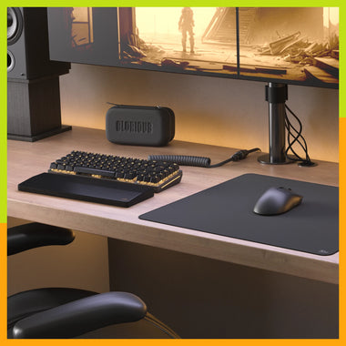 a computer desk with a keyboard mouse and mouse pad