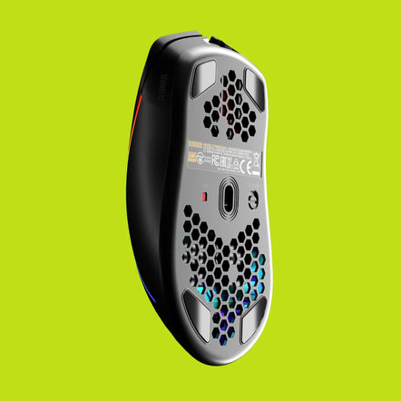 a black computer mouse with hexagons