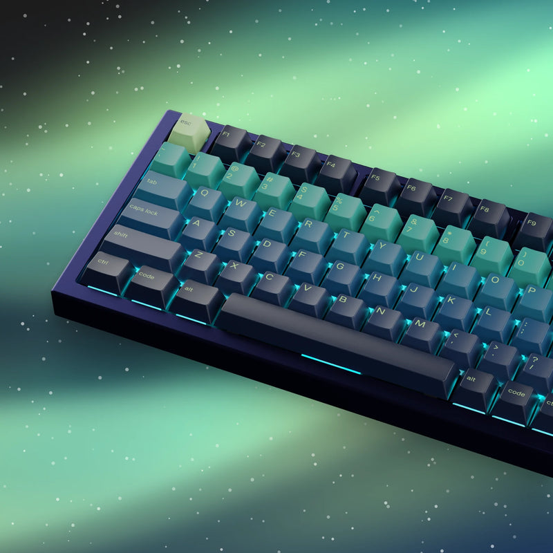 GPBT Northern Lights keycaps on a GMMK PRO keyboard with a Navy Blue top frame against an aurora borealis background