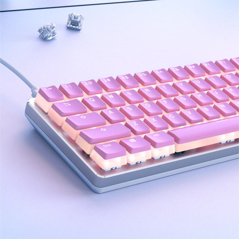 Aura V2 keycaps in Pink on a GMMK 2 keyboard in a bright white desk setup