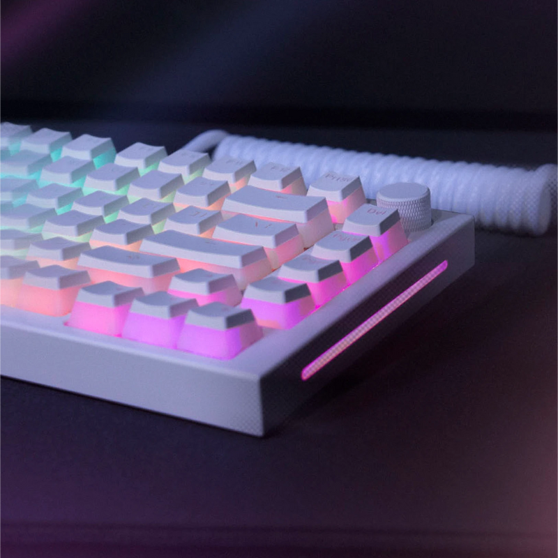 Aura V2 keycaps in White on a White Ice GMMK PRO keyboard with Ghost White coiled cable in a dark desk setup