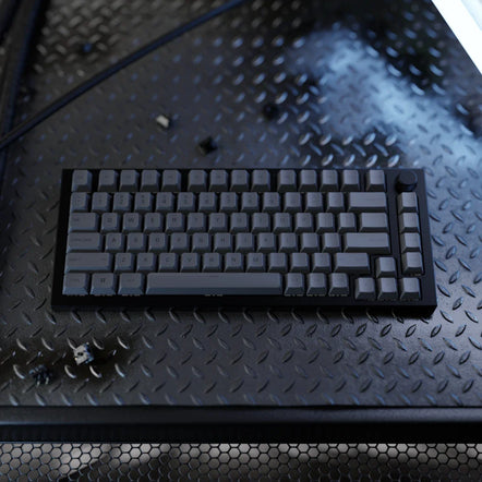 a keyboard on a metal surface