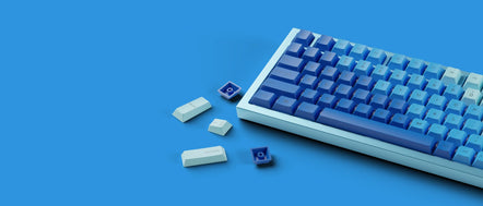 a keyboard and keys on a blue background