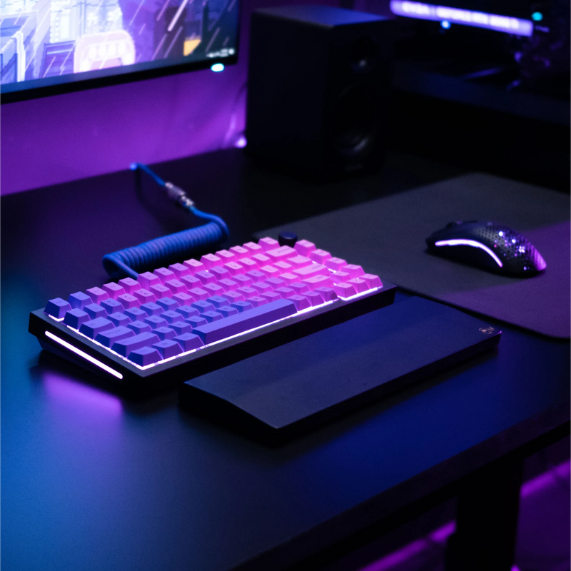 GPBT Nebula keycaps on a Black Slate GMMK PRO keyboard with Nebula coiled cable in a dark black and purple desk setup