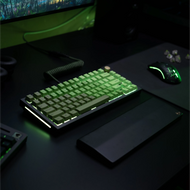 GPBT Olive keycaps on a Black Slate GMMK PRO keyboard with Gold rotary knob and Forest Green coiled cable in a black and green desk setup