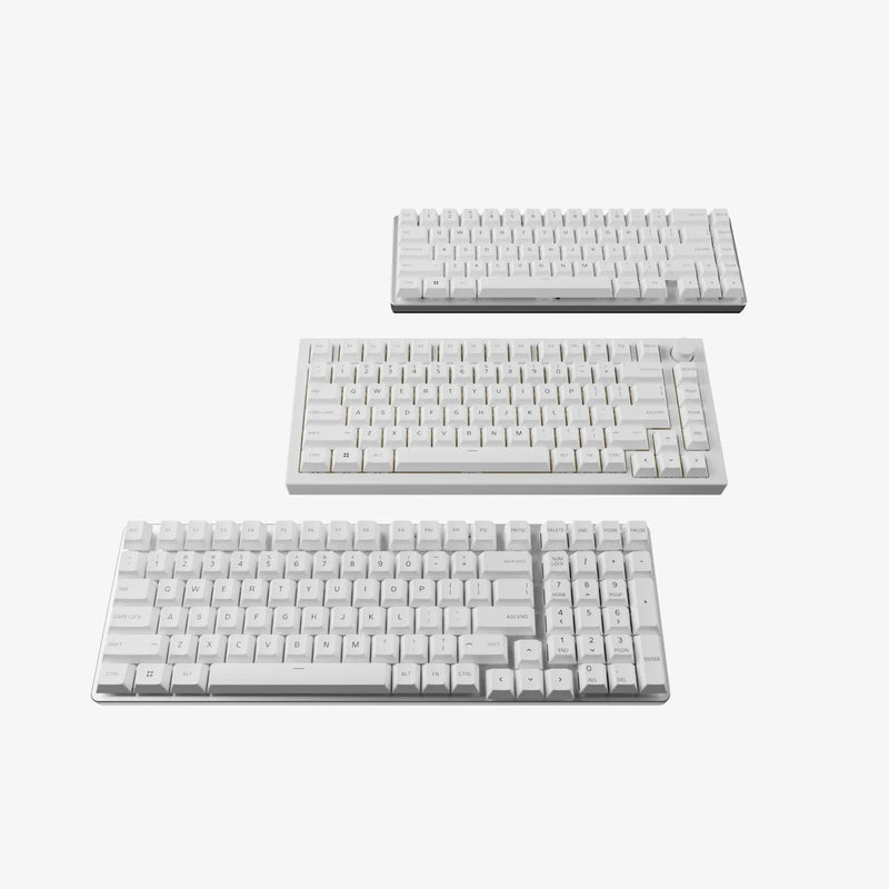 GPBT Arctic White keycaps on three different keyboard sizes, 65%, 75%, and 96%