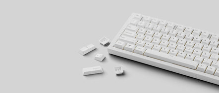 a white keyboard with keys