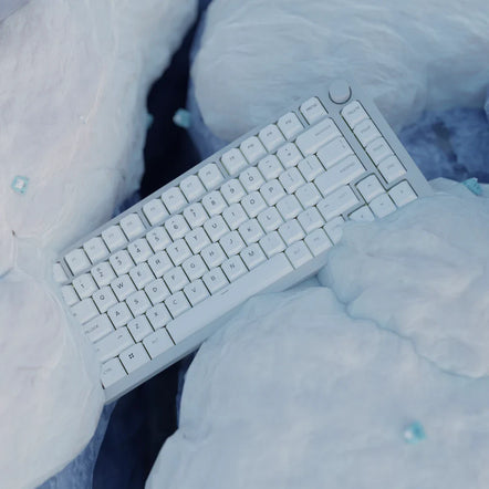 a keyboard in a pile of plastic