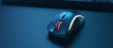 a computer mouse with a red light