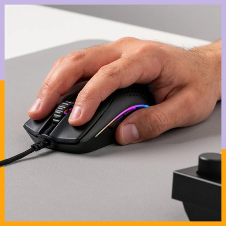 a hand on a computer mouse