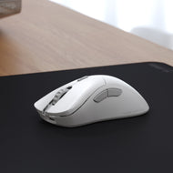 Model D 2 PRO 4K 8KHz Edition Mouse in White in a neutral desk setup