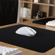 Model D 2 PRO 4K 8KHz Edition Mouse in White in a neutral desk setup