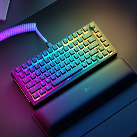 a keyboard with a colorful cable