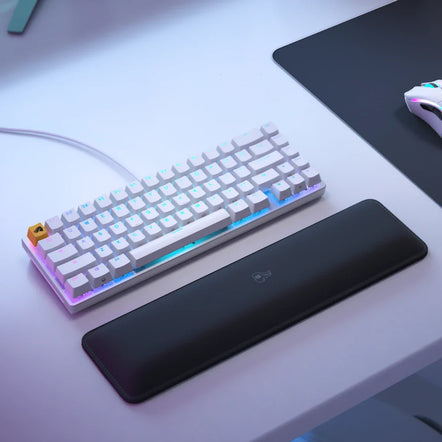 a keyboard and mouse on a desk