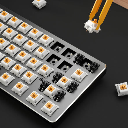 a keyboard with many small white and yellow buttons