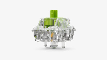 a clear plastic device with a green top