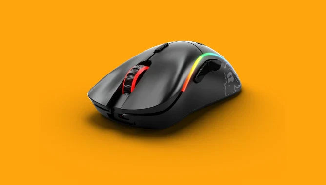 a black computer mouse with a rainbow light