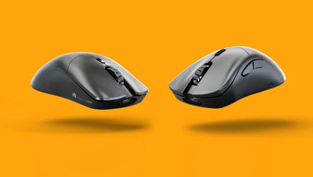 two black computer mouses on a yellow background