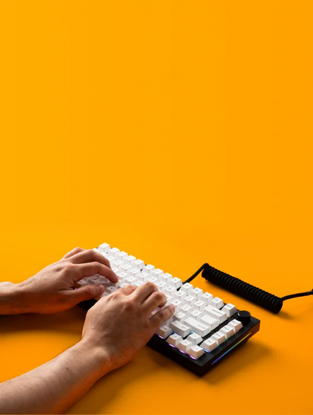 a person typing on a keyboard