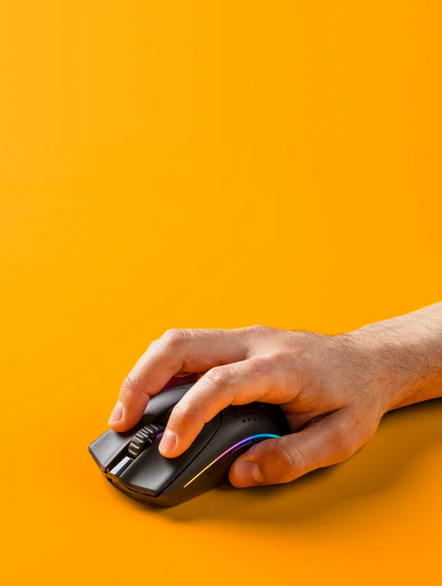 a hand holding a computer mouse